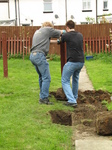 SX18067 Marijn and Matt lifting concreted pole.jpg